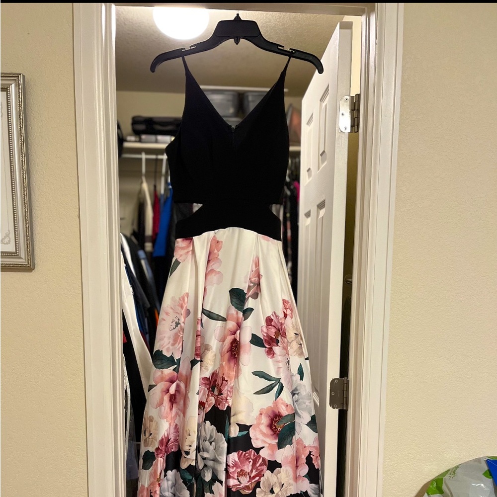 Floor length prom dress with mesh side panels. Only worn once